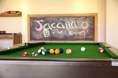 a pool table with balls on top of it at Jacana River Lodge Mjejane Game Reserve in Hectorspruit