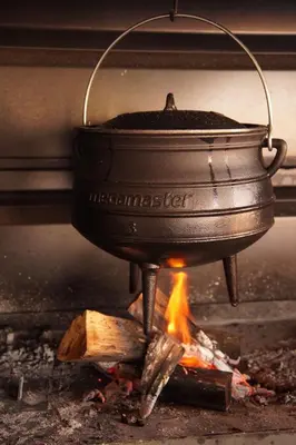a pot sitting on top of a fire at Uchawi wa Afrika in Marloth Park
