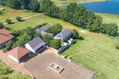 an aerial view of a house on a field at 109 Upwood in Dullstroom
