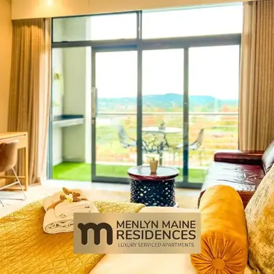 Menlyn Maine Residences - Napoli with king sized bed