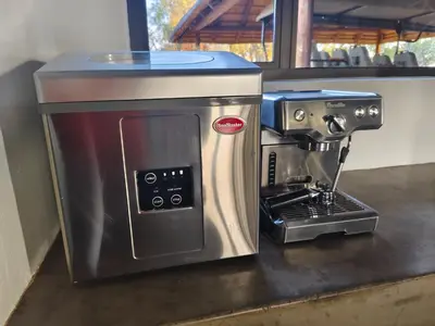 a coffee maker sitting on a counter next to a coffee machine at Elandsfontein 21, Mabalingwe in Mabula