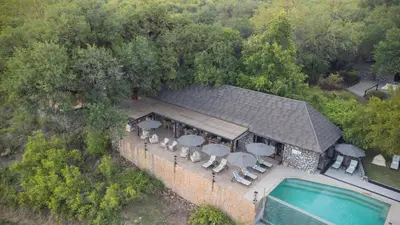 an aerial view of a building with a swimming pool at Last Word Kitara in Klaserie Private Nature Reserve