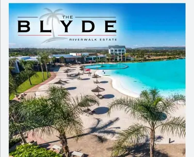 a magazine cover of a resort with a beach with palm trees at The Blyde Riverwalk Estate in Pretoria
