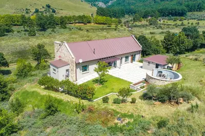 an aerial view of a house on a hill at 93 Hillcrest in Dullstroom