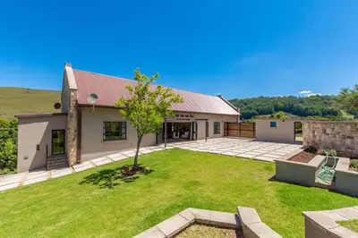 a house with a large yard in front of it at 93 Hillcrest in Dullstroom