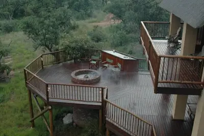 an aerial view of a deck with a fire pit at Ngong Hill, Mabalingwe in Bela-Bela