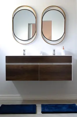 two mirrors above a sink in a bathroom at The Stables, Beaulieu Kyalami in Midrand