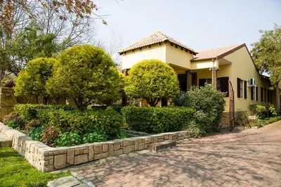 a house with a brick driveway in front of a house at Stans &co in Bethal