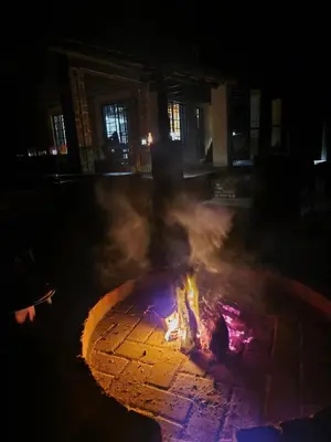 a fire pit at night with smoke coming out at Injabulo in Marloth Park