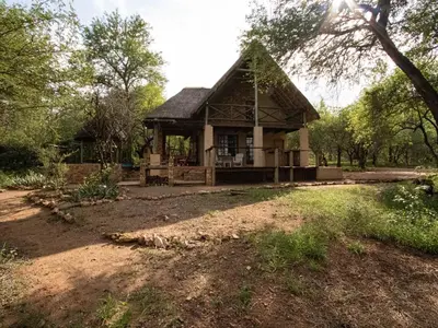 a small house in the middle of a field at Injabulo in Marloth Park