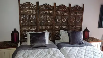 a bedroom with two beds next to each other at Wooden Creek Estate in Kempton Park
