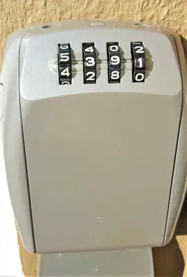 a close up of a gray toaster with the word listen at Meadowbrook Guesthouse in Pretoria