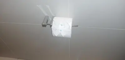 a roll of toilet paper hanging on a refrigerator at Prisatt Boutique Hotel in Onverwacht