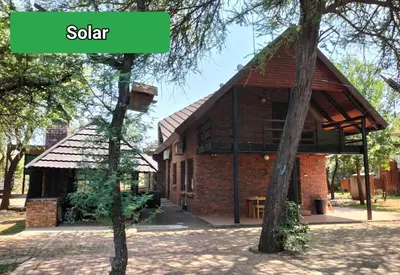 a brick building with a sign that reads solar at Marloth Wild Fig in Marloth Park
