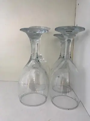 two clear glass vases sitting on a table at Apartments in Menlyn Maine, at Menlyn Place in Pretoria