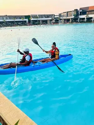 two people in a kayak in the water at The Blyde Crystal Lagoon Cologne4 in Pretoria