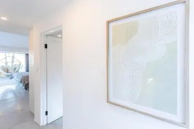 a framed picture on a wall in a living room at Waterfront Serenity View in Hartbeespoort