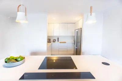 a kitchen with a counter with a bowl of fruit at Waterfront Serenity View in Hartbeespoort