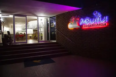 a neon sign on the side of a building at Tshipise A Forever Resort in Tshipise
