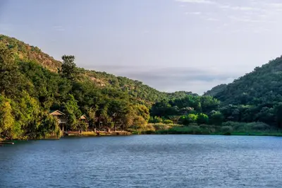 a view of a lake with mountains in the background at ATKV Klein-Kariba in Bela-Bela