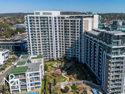 an aerial view of a large building in a city at Menlyn Maine Luxury Rentals in Pretoria