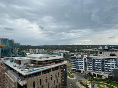 an aerial view of a city with buildings at Menlyn Maine Trilogy 11th Floor in Pretoria