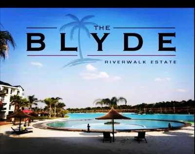 a poster for the bvlgari resort in the maldives at The Blyde in Pretoria