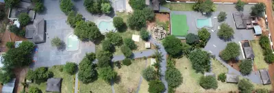 an overhead view of a yard with trees and buildings at Together Lifestyle Resort in Malamulele