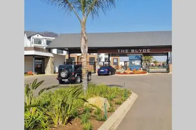 a jeep parked in front of a building at The Blyde Crystal Lagoon in Pretoria