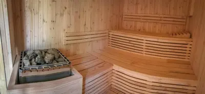 an empty sauna with wooden walls and wooden floors at Laluka Safari Lodge - Welgevonden Game Reserve in Welgevonden Game Reserve