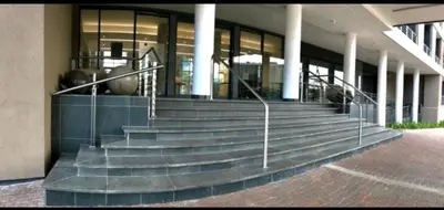 a group of stairs in front of a building at Menlyn Maine Luxury Apartments in Pretoria