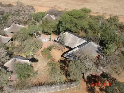 an aerial view of a house with trees at Sondela Nature Reserve & Spa Moselesele Tents in Bela-Bela