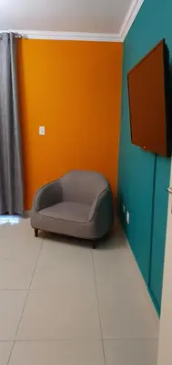 a bed sitting on the floor in a room at TERTIUS LODGE in Nelspruit