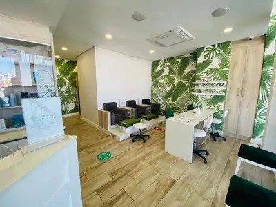 an office with desks and chairs and plants on the walls at The Blyde - Unit 1136 in Pretoria