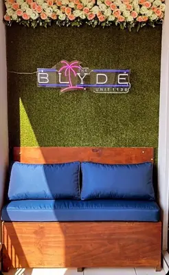 a green wall with a sign on top at The Blyde - Unit 1136 in Pretoria