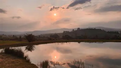 a reflection of the sunset in a pond at Schaefers' Halt in Dullstroom