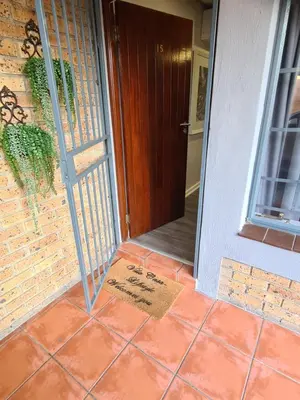 a welcome mat in front of a door at Villa Casa Lifestyle in Nelspruit