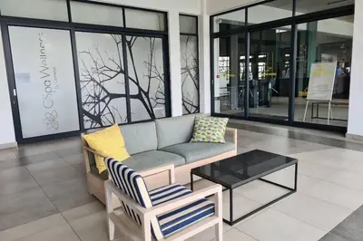 a living room with a couch and a coffee table at The Blyde - Little Place, Lots of Relaxation in Pretoria