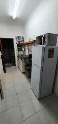 a kitchen with a refrigerator and a sink at Sister's Haven in Nelspruit
