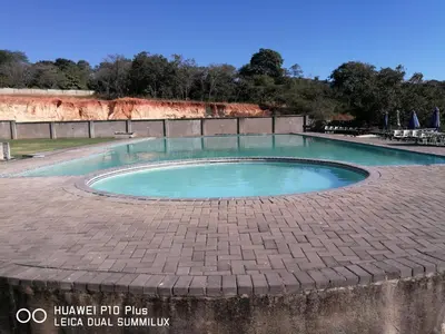a small pool of water in a brick patio at SIMA SILVER LODGE in Tzaneen