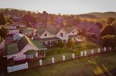 an aerial view of a house with a fence at Westlodge at Graskop B&B in Graskop