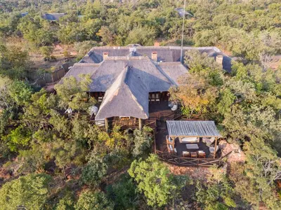 an aerial view of a house on a hill at Tintswalo Waterberg in Vaalwater