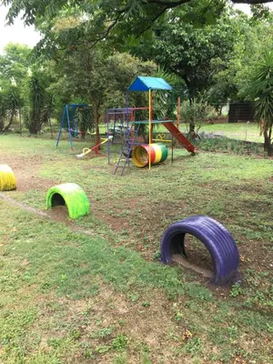 a playground with different types of playground equipment at JB Countrylife Accommodation in Koedoe