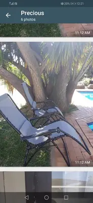a picture of a chair in front of a tree at Lior-Gil accommodation- in Kempton Park