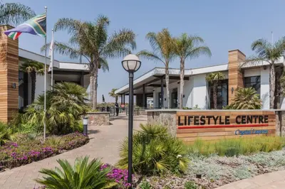 a street light in front of a life service center at #Alimama Spaces The Fountain Blyde in Pretoria