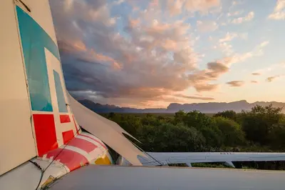a view of the tail end of an airplane at Aerotel in Hoedspruit