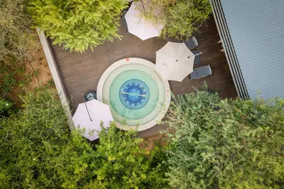 an aerial view of a clock on the side of a house at Aerotel in Hoedspruit