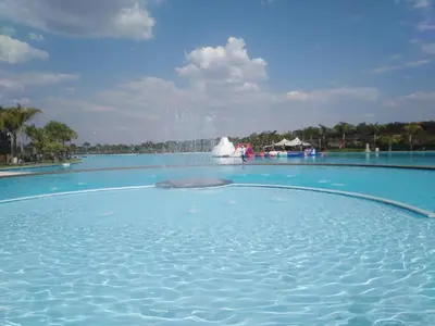 a fountain in the middle of a swimming pool at The Blyde Riverwalk Estate, R104 Bronkhorstspruit Road in Pretoria