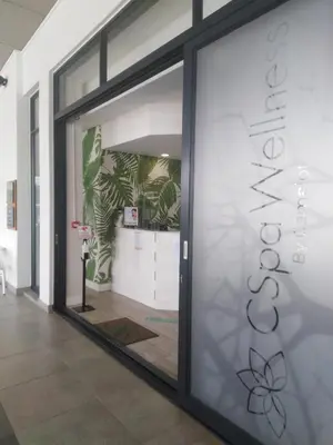 a sliding glass door with a sign on it at The Blyde Riverwalk Estate, R104 Bronkhorstspruit Road in Pretoria