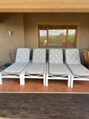 a row of empty seats in a waiting room at Luna rossa 19 Zebula golf course and spa resort in Mabula